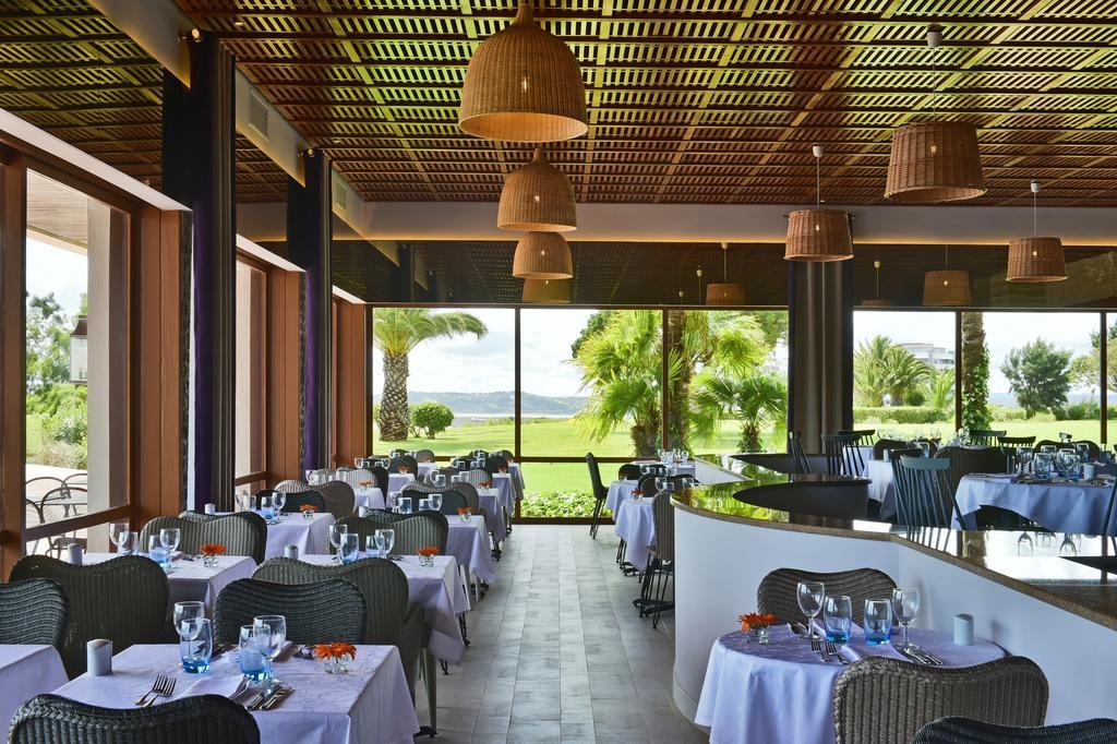 페스타나 알보르 프라이아 비치 앤 골프 리조트 호텔 외부 사진 The restaurant at the clubhouse